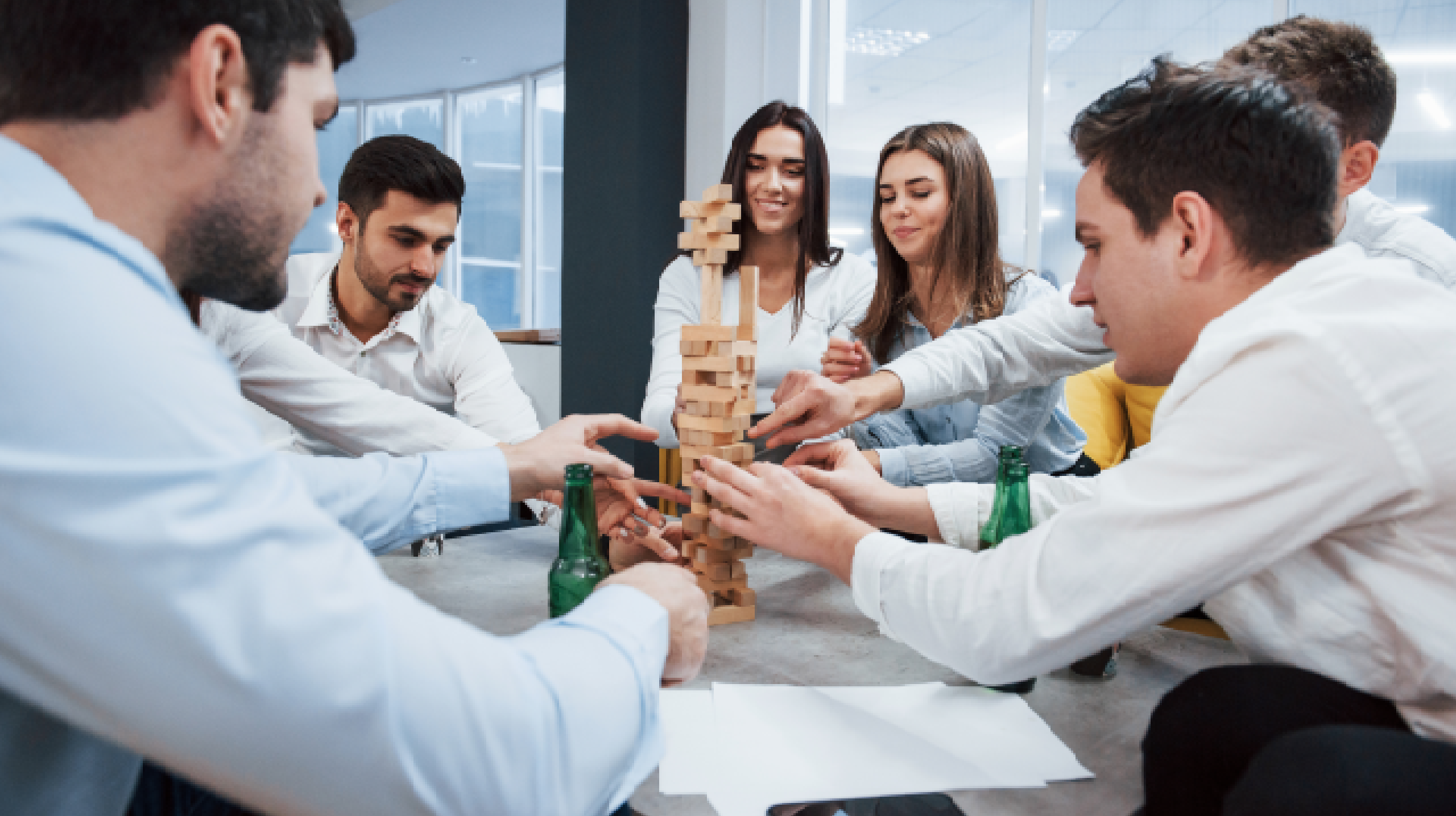Employees participating in corporate event games management activity